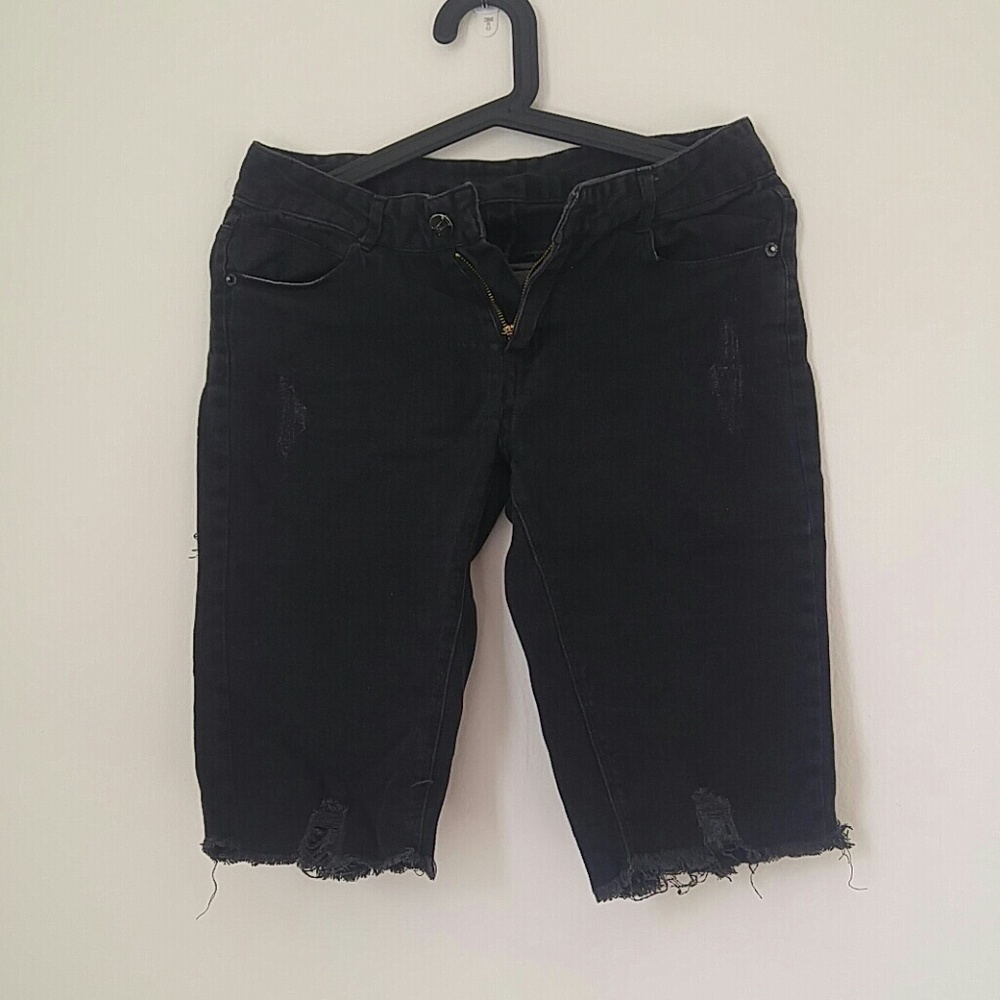 Knee cut black jeans